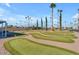 Landscaped putting green inviting relaxation and fun with friends and neighbors at 2700 E Allred Ave # R87, Mesa, AZ 85204