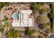 Aerial view showcasing the entire property with pool, putting green, and lush landscaping at 37809 N 9Th Pl, Phoenix, AZ 85086