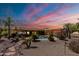 Inviting backyard featuring a pool with waterfall feature, desert landscaping, and patio furniture at 37809 N 9Th Pl, Phoenix, AZ 85086