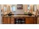 Double sink bathroom vanity featuring granite countertops and stylish vessel sinks at 37809 N 9Th Pl, Phoenix, AZ 85086