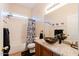 Stylish bathroom with a modern vessel sink, granite countertop, and tub at 37809 N 9Th Pl, Phoenix, AZ 85086