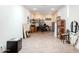 Versatile bonus room with wood-look floors, a built-in bookcase, and natural light at 37809 N 9Th Pl, Phoenix, AZ 85086