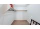 Walk-in closet with carpeted floor and shelving at 37809 N 9Th Pl, Phoenix, AZ 85086