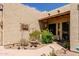 Front yard with desert landscaping, courtyard, and covered entryway to the home at 37809 N 9Th Pl, Phoenix, AZ 85086