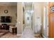 Inviting hallway with decorative accents and tile flooring, leading to various rooms within the home at 37809 N 9Th Pl, Phoenix, AZ 85086