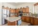 Beautiful kitchen boasts stainless steel appliances, granite countertops, and ample cabinet space at 37809 N 9Th Pl, Phoenix, AZ 85086