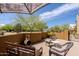 Outdoor patio area with lounge furniture and privacy wall at 37809 N 9Th Pl, Phoenix, AZ 85086