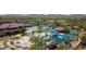 Scenic view of the expansive community pool area with water slides and recreation area for the community at 41202 N Rolling Green Way, Anthem, AZ 85086