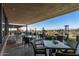 Enjoy outdoor dining with stunning desert views from this spacious patio area at 41202 N Rolling Green Way, Anthem, AZ 85086