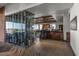 Elegant restaurant area featuring a full bar, climate-controlled wine storage and scenic outdoor views at 41202 N Rolling Green Way, Anthem, AZ 85086