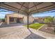Outdoor patio area with a gazebo, lush green grass, and a well-maintained yard at 4232 S 103Rd Ln, Tolleson, AZ 85353