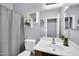 Cozy bathroom featuring a sink, mirror and shower at 4232 S 103Rd Ln, Tolleson, AZ 85353