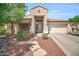 Charming single-story home with a well-manicured front yard and inviting entryway at 4232 S 103Rd Ln, Tolleson, AZ 85353