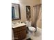 Cozy bathroom with decorative wall art, white toilet, framed mirror, and decorative shower curtain creates a relaxing space at 426 W Pontiac W Dr # 4, Phoenix, AZ 85027
