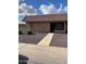 Charming single-story home featuring well-kept landscaping, sidewalk and classic desert design at 426 W Pontiac W Dr # 4, Phoenix, AZ 85027