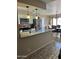 Well-equipped kitchen with granite countertops and stainless steel appliances, open to dining area at 426 W Pontiac W Dr # 4, Phoenix, AZ 85027