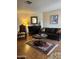 Inviting living room with a fireplace, a comfortable sofa, and stylish decor at 426 W Pontiac W Dr # 4, Phoenix, AZ 85027