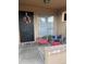 Cozy covered porch with seating area, decorative wreath, and a welcoming atmosphere at 426 W Pontiac W Dr # 4, Phoenix, AZ 85027