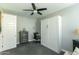Well-lit room features a murphy bed, a writing desk, and a dresser at 4817 N 35Th St, Phoenix, AZ 85018