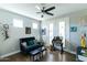 Cozy living room with ample natural light, hardwood floors, blue sofa and small tables at 4817 N 35Th St, Phoenix, AZ 85018