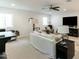 Bright living room with cozy seating, a ceiling fan, and neutral decor, ideal for relaxation and entertainment at 4817 N 35Th St, Phoenix, AZ 85018