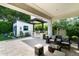 Charming patio with outdoor kitchen, ample seating, and a quaint shed in a landscaped backyard at 4817 N 35Th St, Phoenix, AZ 85018