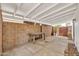 Back patio with concrete flooring, a block wall, and covered ceiling perfect for entertaining guests at 5126 W Las Palmaritas Dr, Glendale, AZ 85302