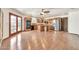 Spacious kitchen featuring wood cabinets, modern appliances, a center island and access to the pool area at 5126 W Las Palmaritas Dr, Glendale, AZ 85302