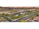 Aerial view showcasing the community near retail and commercial centers, offering convenient shopping and dining options at 5231 W Desperado Way, Phoenix, AZ 85083