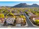 Scenic aerial view of the community with common area and mountain backdrop at 5231 W Desperado Way, Phoenix, AZ 85083