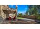 Spacious backyard with an outdoor seating area and an upper-level balcony at 5231 W Desperado Way, Phoenix, AZ 85083