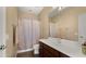 Bathroom with vanity, sink, shower with curtain, mirror, and recessed lighting at 5231 W Desperado Way, Phoenix, AZ 85083