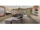 Cozy living room with neutral tones, plantation shutters, recessed lights and a slider to the backyard at 5231 W Desperado Way, Phoenix, AZ 85083