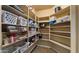 Walk-in pantry with white baskets and plenty of shelving space at 5231 W Desperado Way, Phoenix, AZ 85083