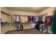 Large walk-in closet providing ample storage and organization space for clothing and accessories at 5231 W Desperado Way, Phoenix, AZ 85083