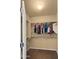 Functional walk-in closet with hanging rods and shelving for optimal organization and storage at 5231 W Desperado Way, Phoenix, AZ 85083