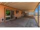 This covered back patio has a concrete floor and is attached to the house at 525 N 94Th Way, Mesa, AZ 85207