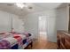 The bedroom features neutral walls and a tiled floor at 525 N 94Th Way, Mesa, AZ 85207