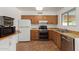 Well-maintained kitchen with gas range, and ample cabinet space at 525 N 94Th Way, Mesa, AZ 85207