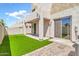 Private backyard with artificial grass and low-maintenance landscaping at 544 N Alma School Rd # 28, Mesa, AZ 85201