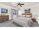 Comfortable bedroom with stylish furnishings, neutral walls and carpet at 544 N Alma School Rd # 28, Mesa, AZ 85201