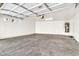 Spacious two-car garage with an automatic door opener and water heater at 544 N Alma School Rd # 28, Mesa, AZ 85201