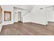 Spacious living area featuring wood flooring, a staircase, and an open layout, perfect for modern living at 544 N Alma School Rd # 28, Mesa, AZ 85201