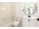 Updated bathroom featuring a tub, shower, and vanity with sleek black hardware at 632 N 95Th St, Mesa, AZ 85207