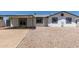 Charming single-story home with a xeriscaped front yard and covered parking at 632 N 95Th St, Mesa, AZ 85207