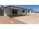 Single-story home featuring a concrete driveway and covered parking at 632 N 95Th St, Mesa, AZ 85207