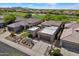 Stunning aerial view showcasing a residential property with desert landscaping near a golf course at 6579 E Shooting Star Way, Scottsdale, AZ 85266