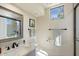 Bright bathroom with modern vanity, glass-enclosed shower, and neutral color palette at 6579 E Shooting Star Way, Scottsdale, AZ 85266