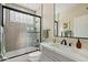 Stylish bathroom featuring a shower-tub combo, sleek vanity, and modern finishes at 6579 E Shooting Star Way, Scottsdale, AZ 85266