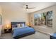 Well-lit bedroom with a large window, cozy lamps, and a comfortable bed at 6579 E Shooting Star Way, Scottsdale, AZ 85266